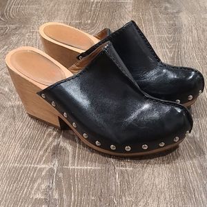 Michael Kors wooden heeled mulesizes. 7.5